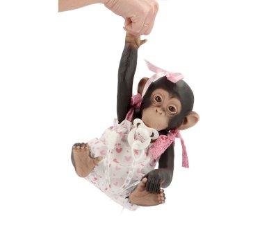 Lola the Chimpanzee with a Romper of Hearts and Pink Lace Bows